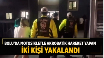 Motosikletle akrobatik hareket yapan iki kişi yakalandı